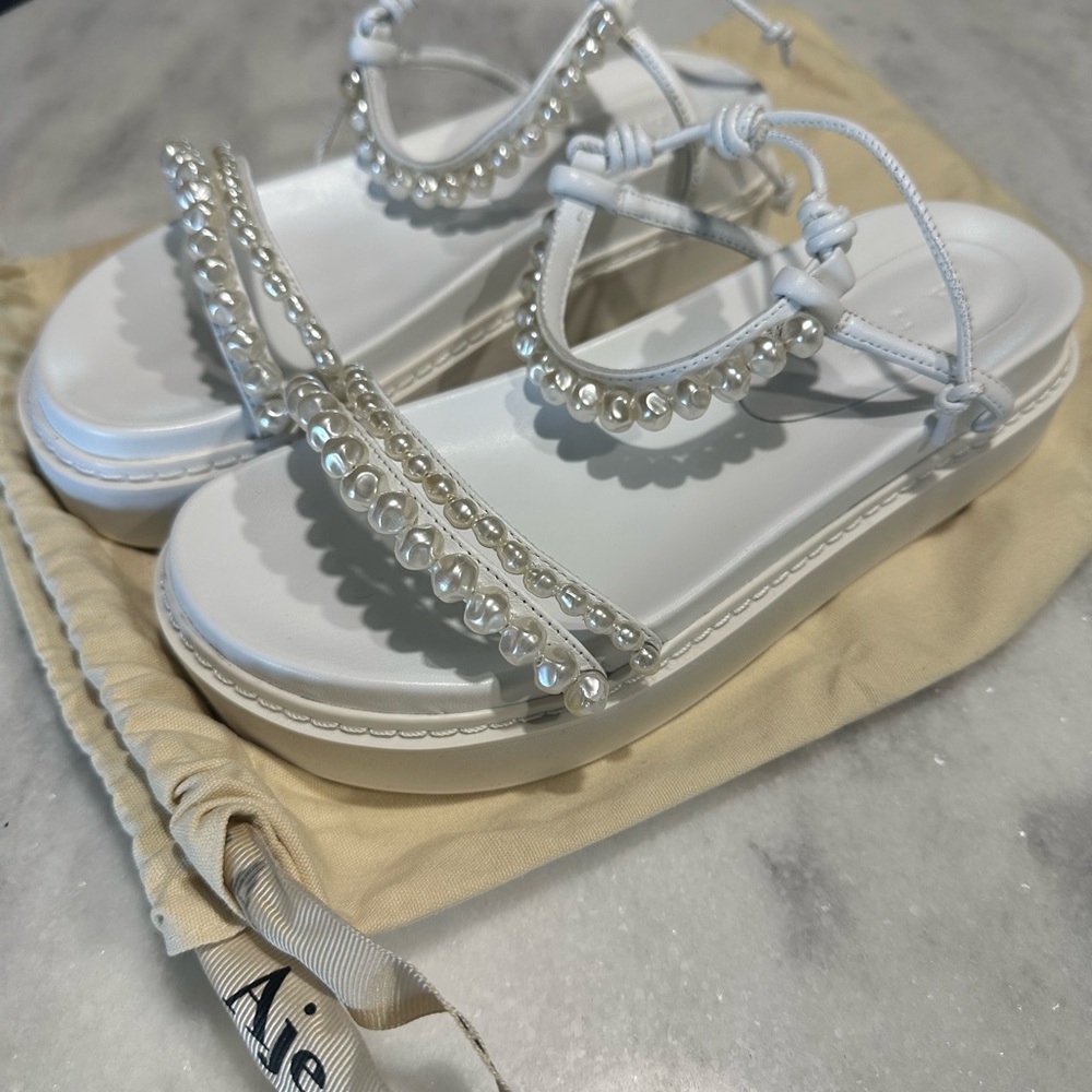 Size 38 or 7.5  AJE Neo Pearl sandals. They are like new & comes with shoe bag.